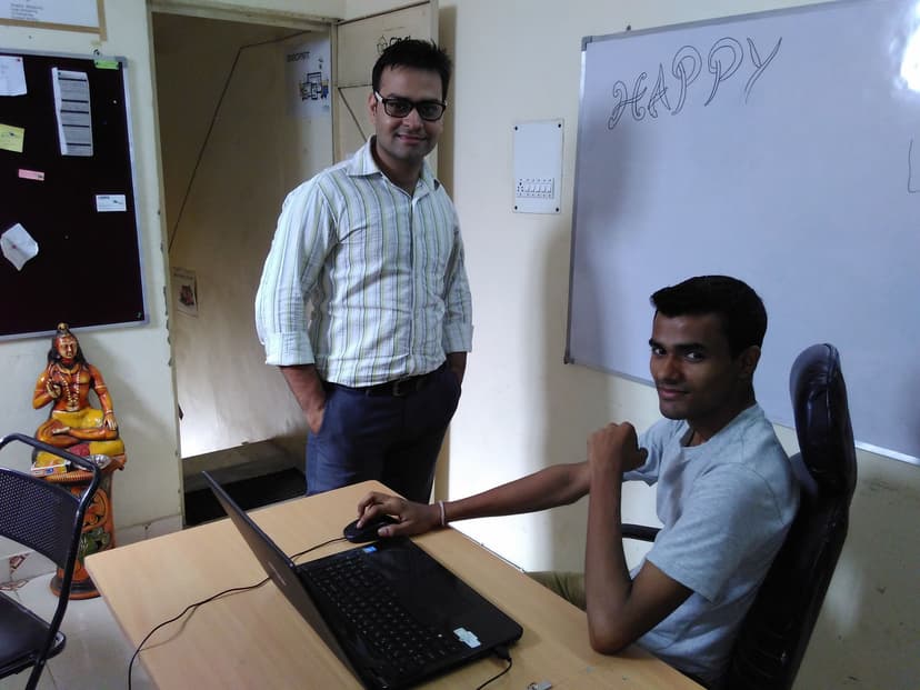 Rahul Maurya standing with a colleague at the Finch Technologies office